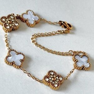Elegant Gold and White Four Clover Leaf Bracelet